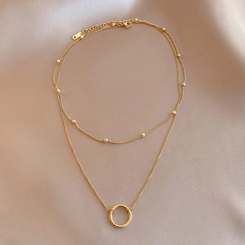 Colar Cruz Banhado a Ouro para Mulheres, Ins Requintado, Aço Inoxidável 304, Simplicidade Anel Pingente, Decoração Jóias Pescoço,
Colar feminino círculo banhado a ouro,
Colar com pingente de círculo dourado,
Acessório feminino elegante e minimalista,
Colar banhado a ouro 18K resistente,
Joias femininas modernas,
Colar círculo dourado sofisticado,
Presente delicado feminino,
Acessório minimalista para mulheres,
Colar com símbolo de harmonia,
Colar feminino casual e elegante,
Joias femininas banhadas a ouro,