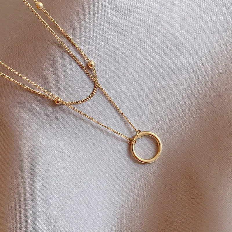Colar Cruz Banhado a Ouro para Mulheres, Ins Requintado, Aço Inoxidável 304, Simplicidade Anel Pingente, Decoração Jóias Pescoço,
Colar feminino círculo banhado a ouro,
Colar com pingente de círculo dourado,
Acessório feminino elegante e minimalista,
Colar banhado a ouro 18K resistente,
Joias femininas modernas,
Colar círculo dourado sofisticado,
Presente delicado feminino,
Acessório minimalista para mulheres,
Colar com símbolo de harmonia,
Colar feminino casual e elegante,
Joias femininas banhadas a ouro,
