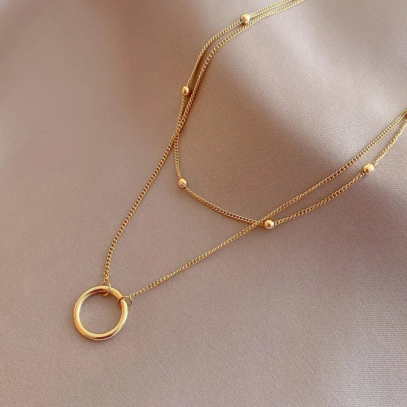 Colar Cruz Banhado a Ouro para Mulheres, Ins Requintado, Aço Inoxidável 304, Simplicidade Anel Pingente, Decoração Jóias Pescoço,
Colar feminino círculo banhado a ouro,
Colar com pingente de círculo dourado,
Acessório feminino elegante e minimalista,
Colar banhado a ouro 18K resistente,
Joias femininas modernas,
Colar círculo dourado sofisticado,
Presente delicado feminino,
Acessório minimalista para mulheres,
Colar com símbolo de harmonia,
Colar feminino casual e elegante,
Joias femininas banhadas a ouro,
