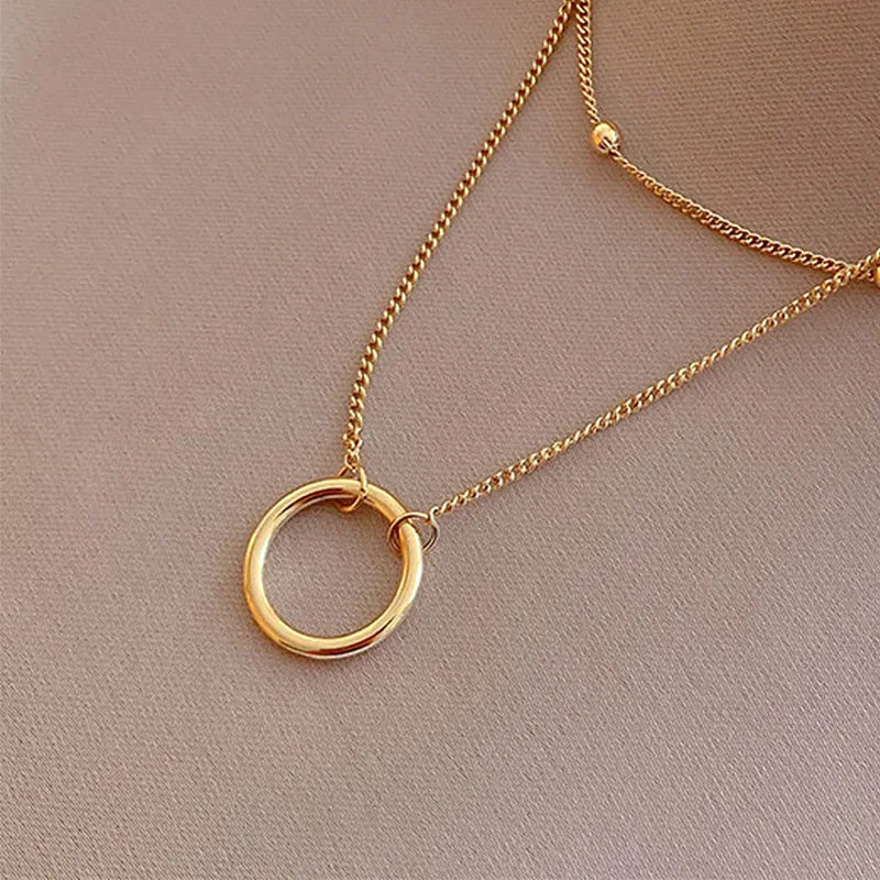 Colar Cruz Banhado a Ouro para Mulheres, Ins Requintado, Aço Inoxidável 304, Simplicidade Anel Pingente, Decoração Jóias Pescoço,
Colar feminino círculo banhado a ouro,
Colar com pingente de círculo dourado,
Acessório feminino elegante e minimalista,
Colar banhado a ouro 18K resistente,
Joias femininas modernas,
Colar círculo dourado sofisticado,
Presente delicado feminino,
Acessório minimalista para mulheres,
Colar com símbolo de harmonia,
Colar feminino casual e elegante,
Joias femininas banhadas a ouro,