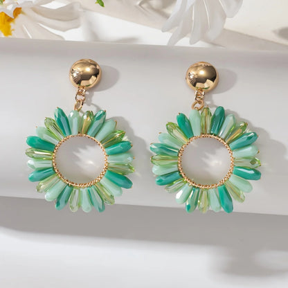 1 par de brincos pendurados boêmios com design de flor oca com strass multicoloridos, com acessórios de festa para roupas diárias