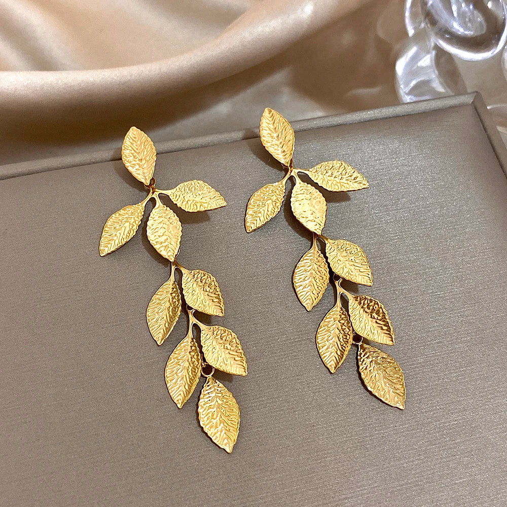 comprar todo dia, Vintage de aço inoxidável grandes folhas longas borla brincos para mulheres moda banhado a ouro folha pingente declaração brinco jóia