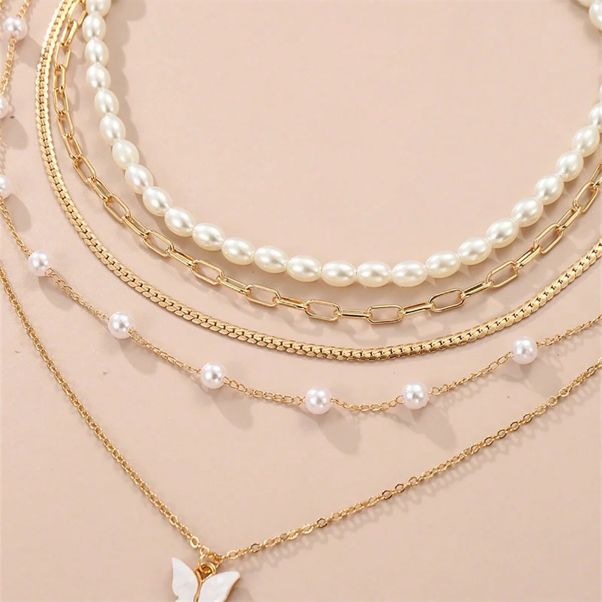 Conjunto simples de colar de pingentes de pérolas e borboletas, design high-end, adequado para uso diário e pendulares, 5 peças por conjunto, Colares femininos elegantes,
Conjunto de joias com borboletas,
Colar de pérolas clássico,
Joias femininas delicadas,
Colares com pingentes para presente,
Conjunto de colares dourados,
