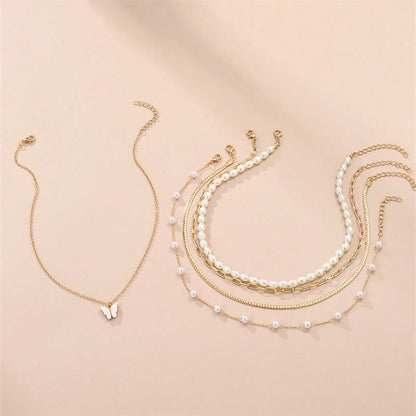 Conjunto simples de colar de pingentes de pérolas e borboletas, design high-end, adequado para uso diário e pendulares, 5 peças por conjunto, Colares femininos elegantes,
Conjunto de joias com borboletas,
Colar de pérolas clássico,
Joias femininas delicadas,
Colares com pingentes para presente,
Conjunto de colares dourados,

